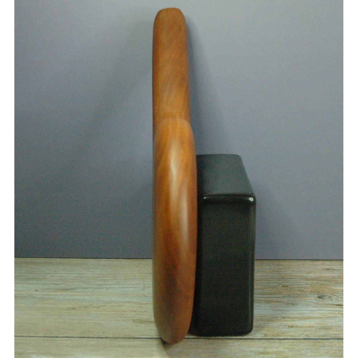 Handcrafted cherrywood paddle designed for thuddy impact sensations.
