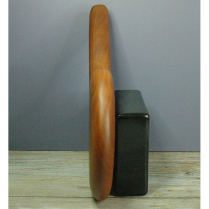Handcrafted cherrywood paddle designed for thuddy impact sensations.