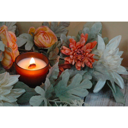 Soy massage candle with coconut oil and shea butter for skin-safe play.